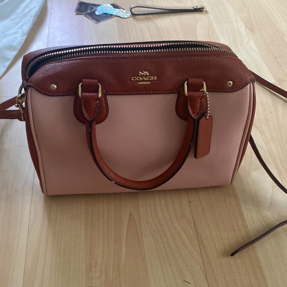pink and burnt orange coach bag